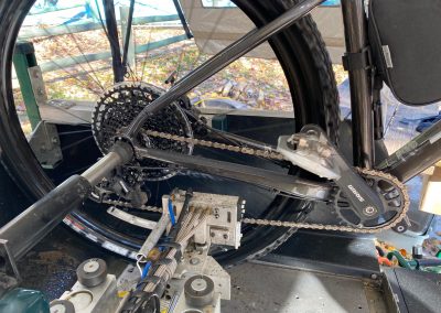 The VonBuckinator™ cleaning and lubricating a bike chain