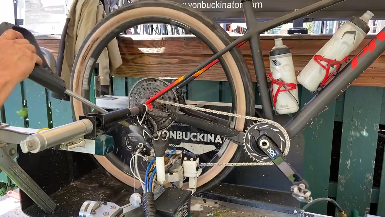The VonBuckinator™ cleaning and lubricating a bike chain